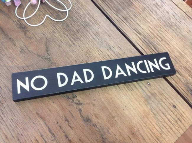 East of India No Dad Dancing Sign